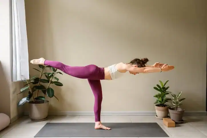 Achieving the Perfect Tone: How Often Should You Exercise for Results? 1 Woman doing Yoga exercise Smethwick to help with toning the body.