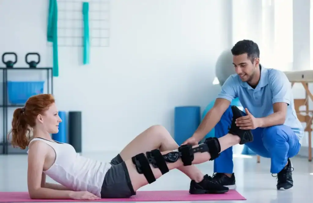 Debunking Meal Timing Myths: The Truth About Muscle Recovery 1 Woman having treatment to help muscle recovery Smethwick after an injury