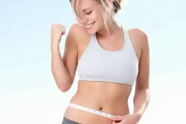 Unraveling the Mystery: Where Does the Body Fat Loss From First? 3 Image of woman happy with fat loss Smethwick